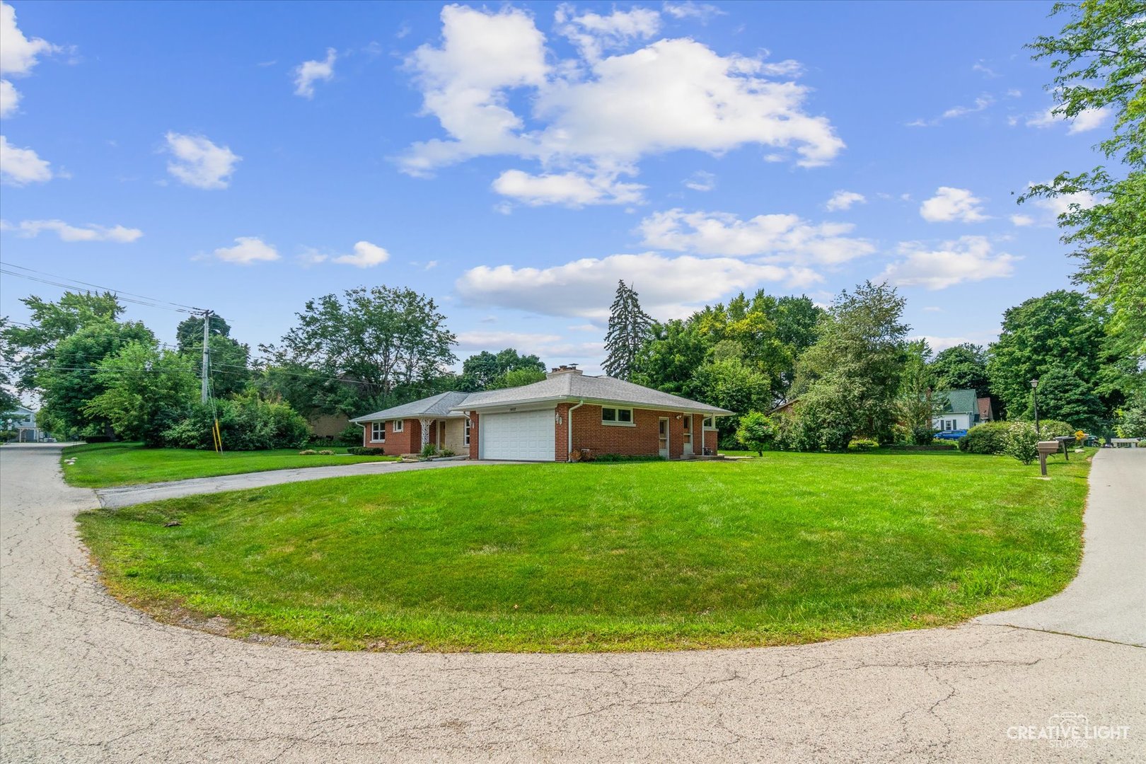 1402 Meadows Road Geneva, IL 60134 - Photo 30 of 30 a view of a house with a backyard