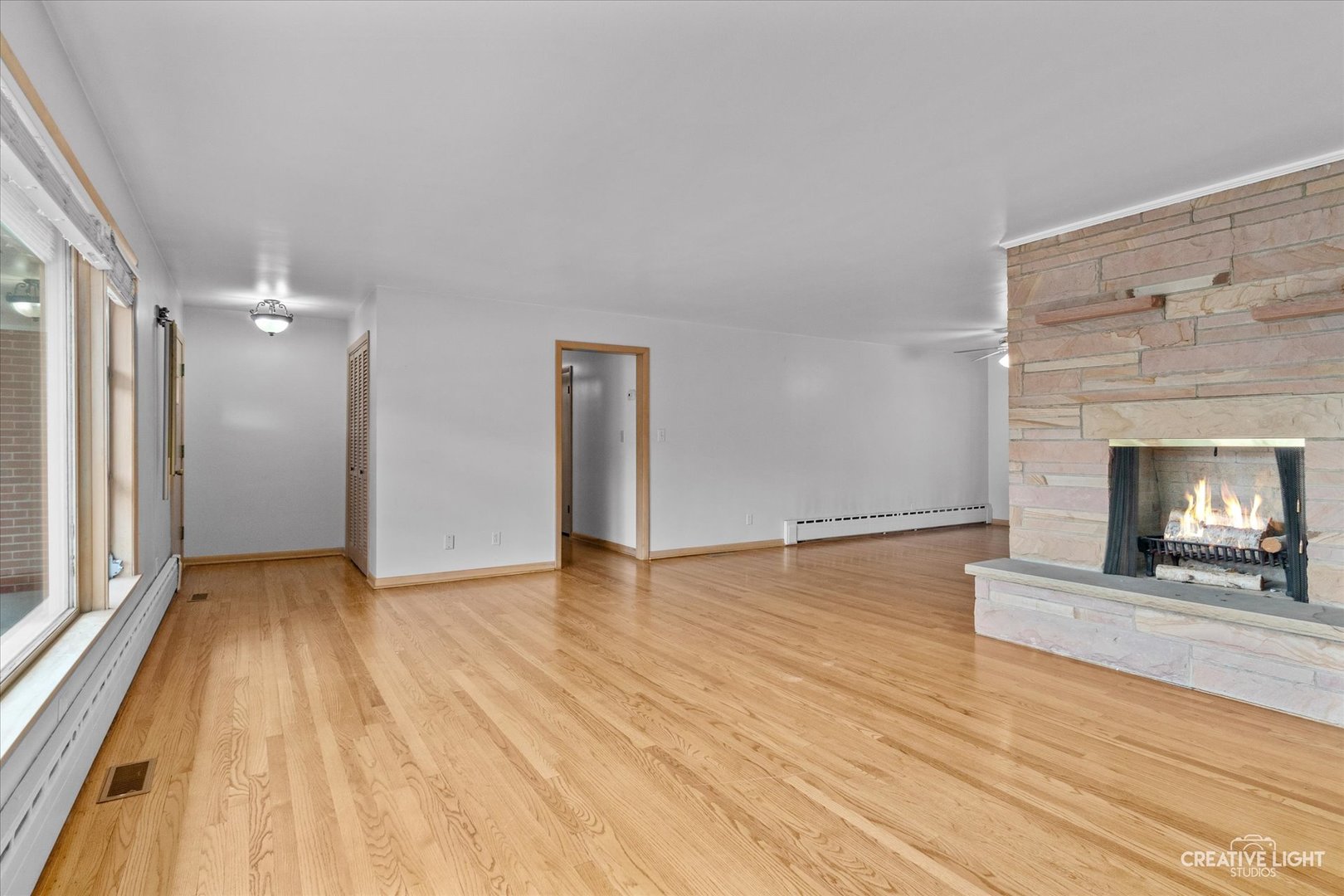 1402 Meadows Road Geneva, IL 60134 - Photo 5 of 30 a view of an empty room and fire place