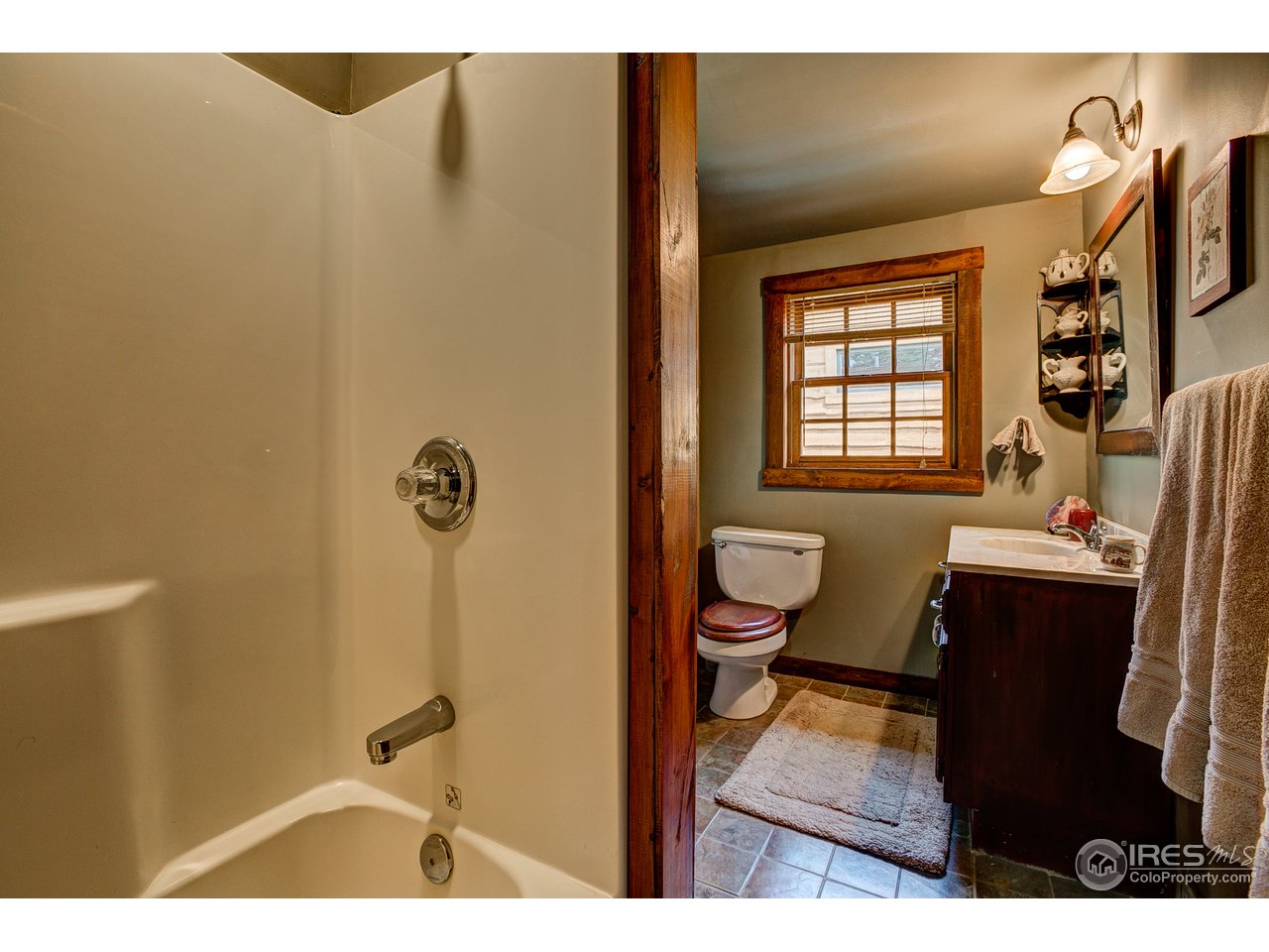 2112 Eagle Cliff Road Estes Park, CO 80517 - Photo 20 of 30 a bathroom with a sink toilet and shower