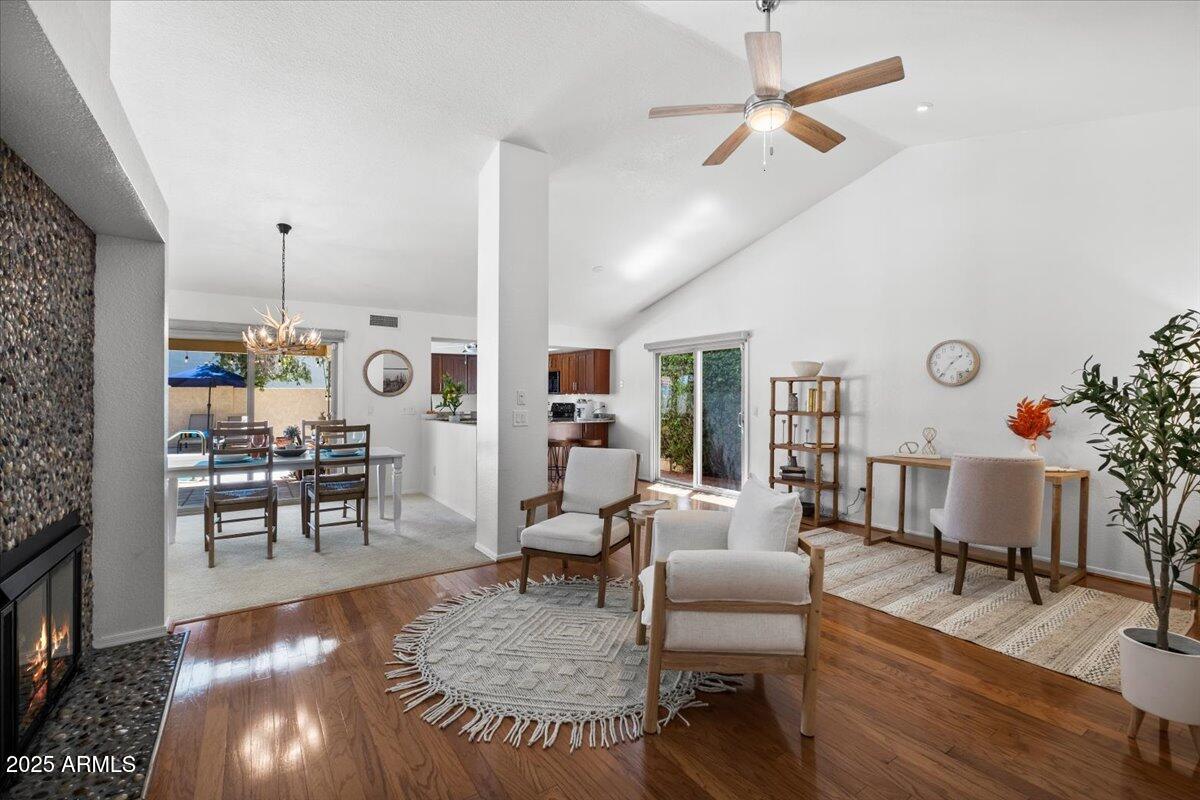 9081 East Sahuaro Drive Scottsdale, AZ 85260 - Photo 8 of 22 a living room with furniture and a table