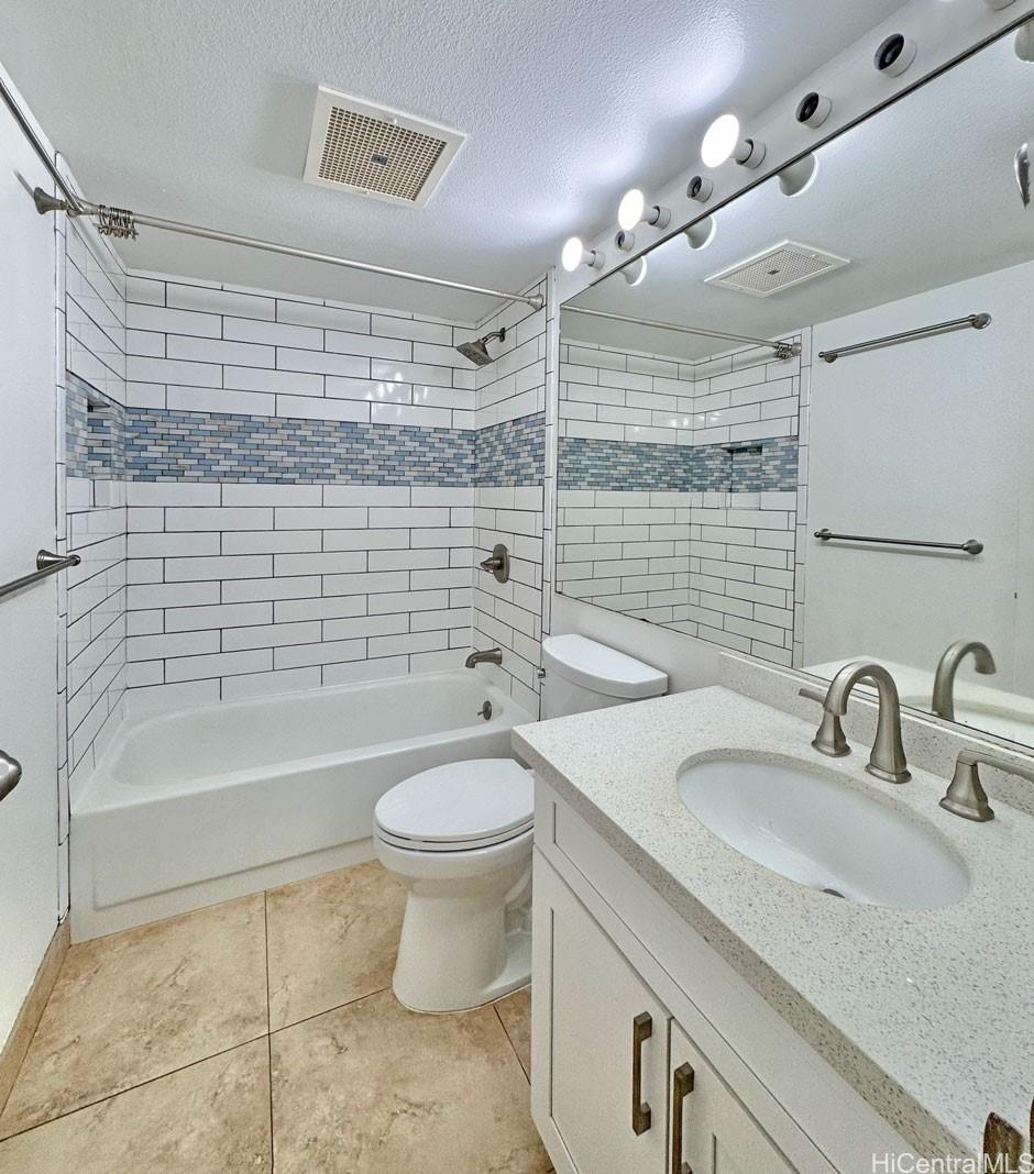 92-1150 Hame Street, Unit 8102 Kapolei, HI 96707 - Photo 19 of 19 a bathroom with a sink a toilet and bathtub