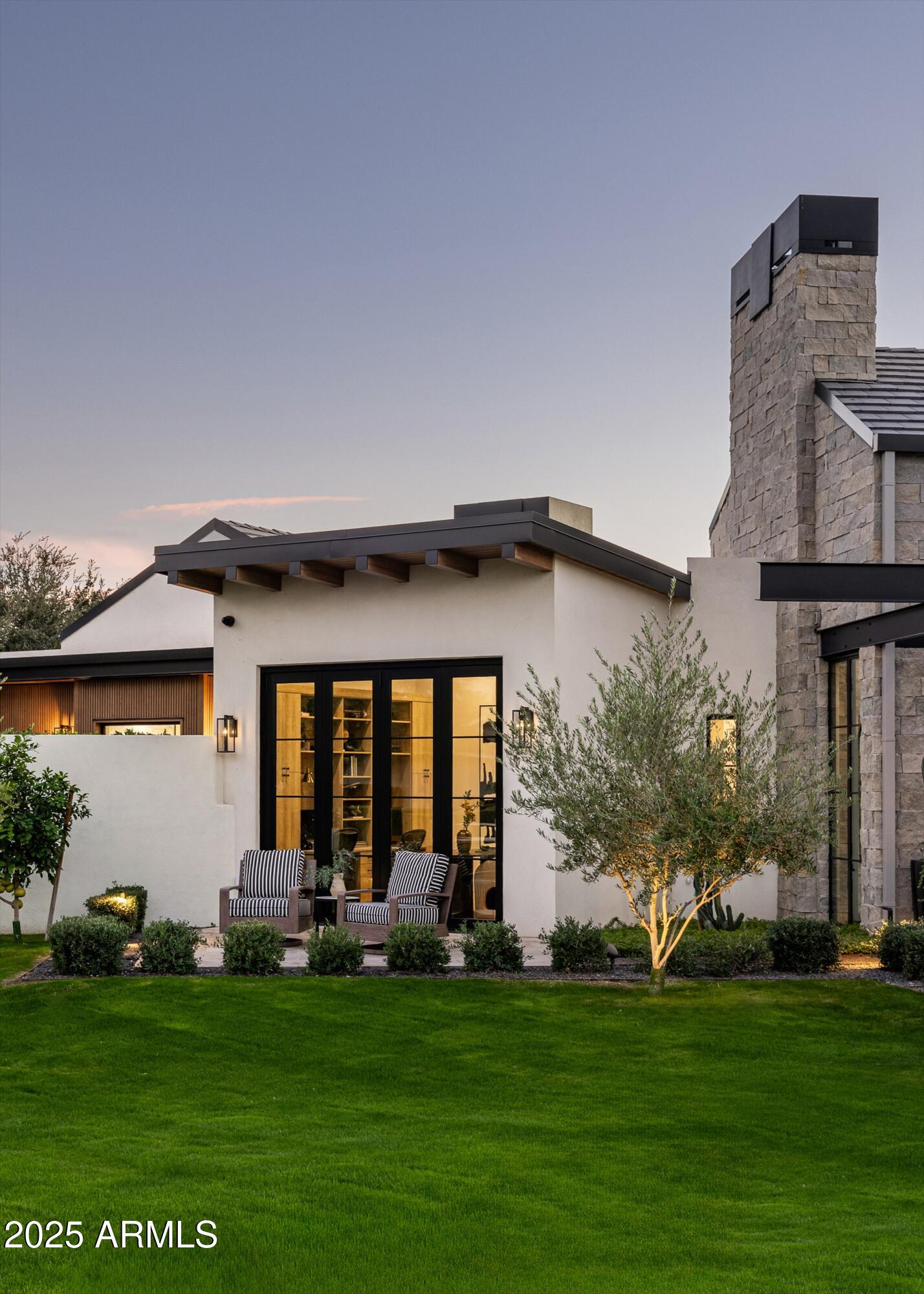 5715 East Monterosa Street Phoenix, AZ 85018 - Photo 110 of 113 a front view of a house with a garden