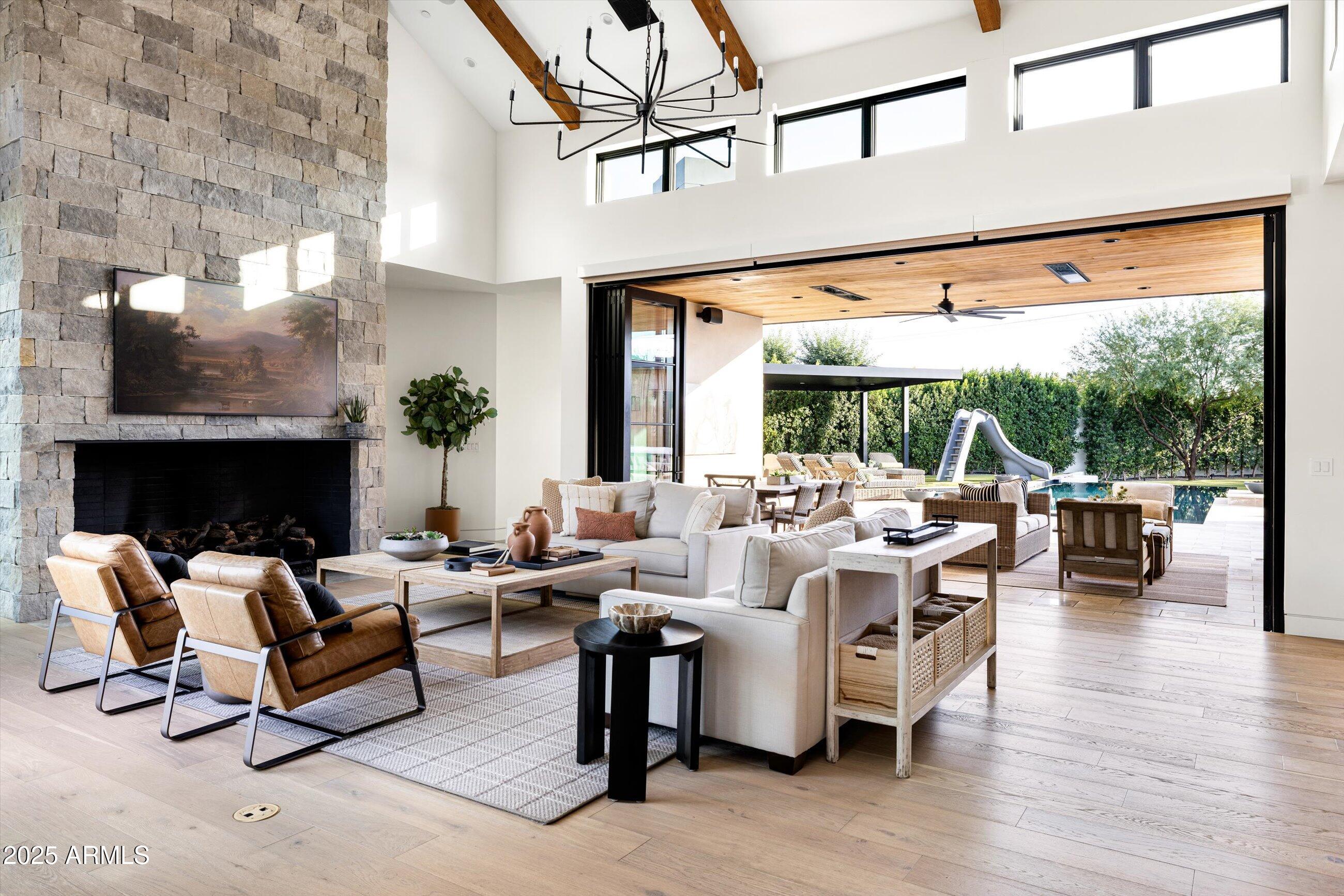 5715 East Monterosa Street Phoenix, AZ 85018 - Photo 14 of 113 a living room with furniture large window and a fireplace