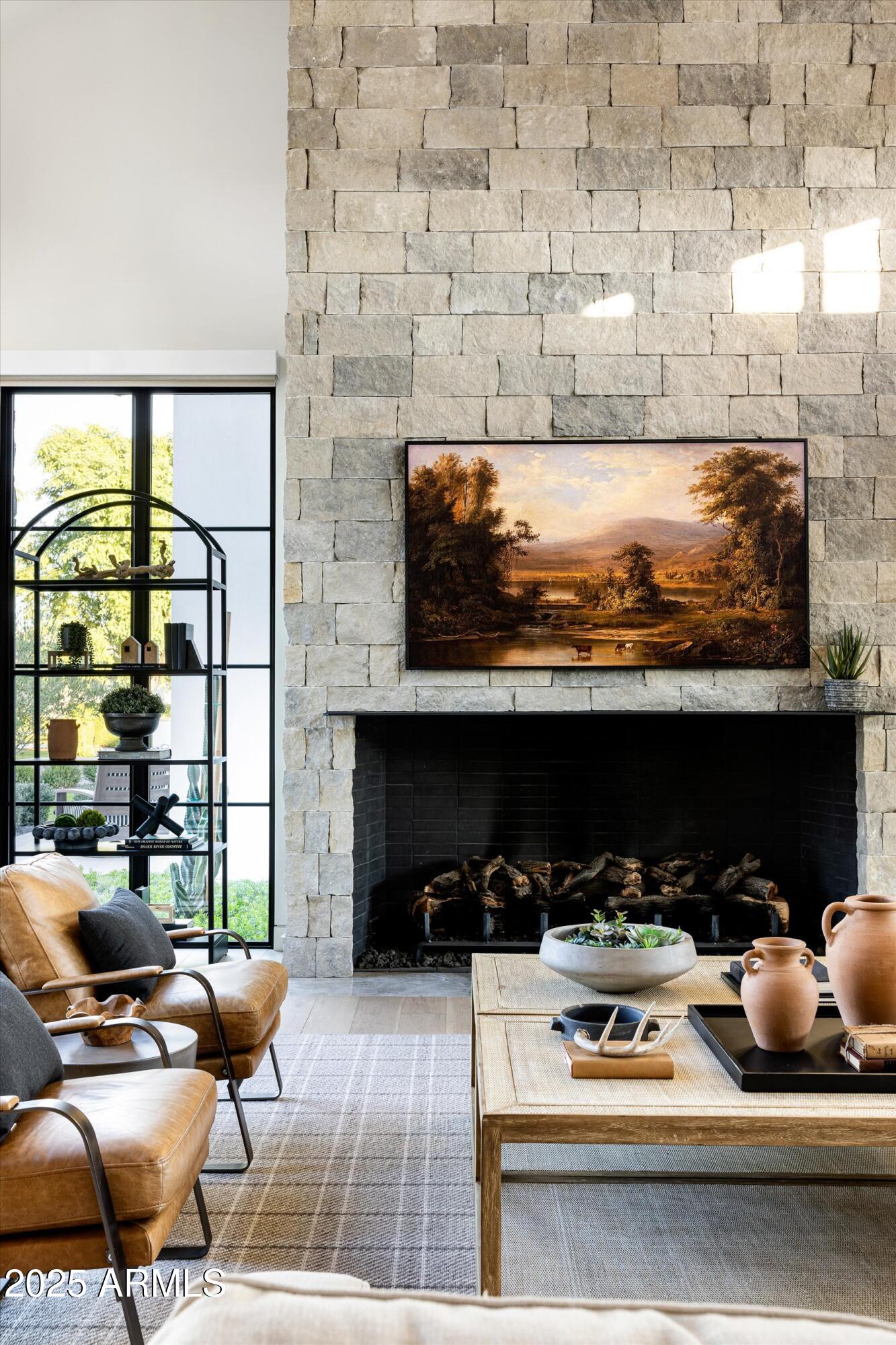 5715 East Monterosa Street Phoenix, AZ 85018 - Photo 15 of 113 a living room with furniture and a floor to ceiling window