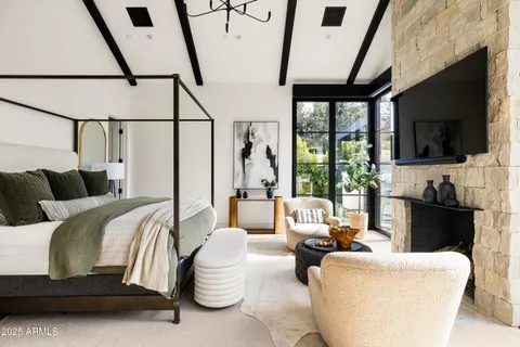 a view of bathroom with a sink and mirror