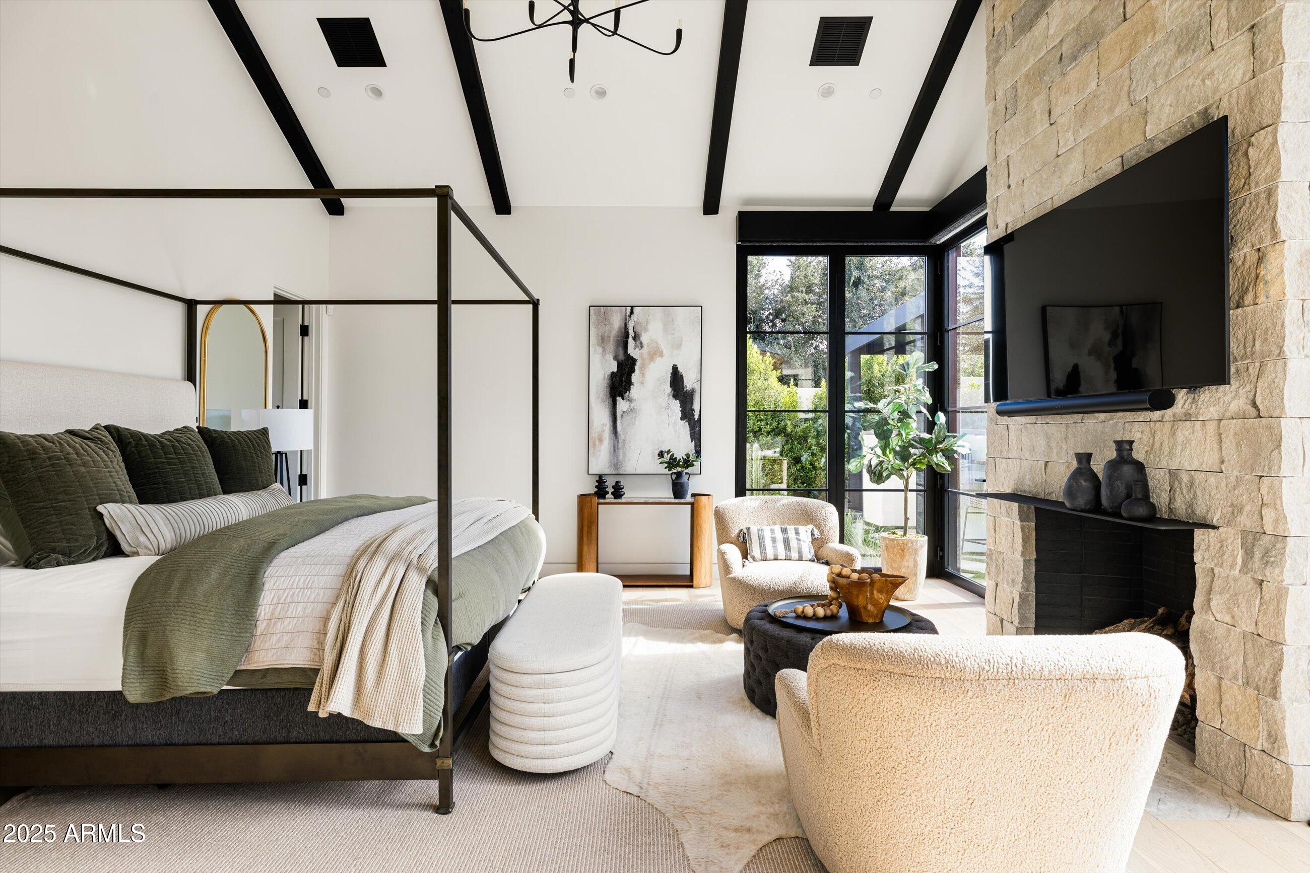 5715 East Monterosa Street Phoenix, AZ 85018 - Photo 18 of 113 a living room with furniture fireplace and flat screen tv