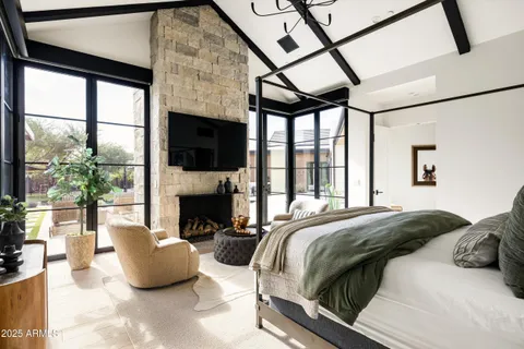 a kitchen with a sink a washer and dryer next to a window