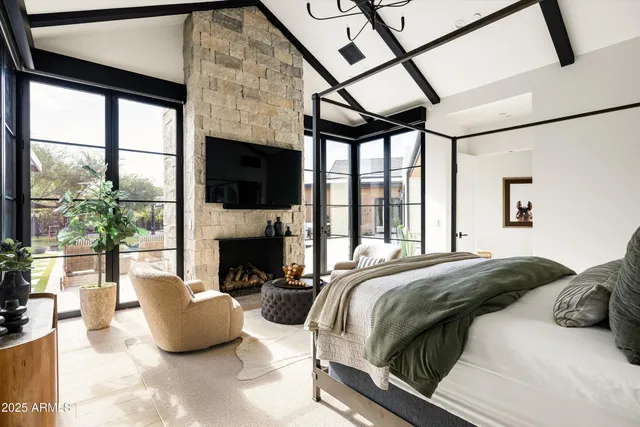 a kitchen with a sink a washer and dryer next to a window