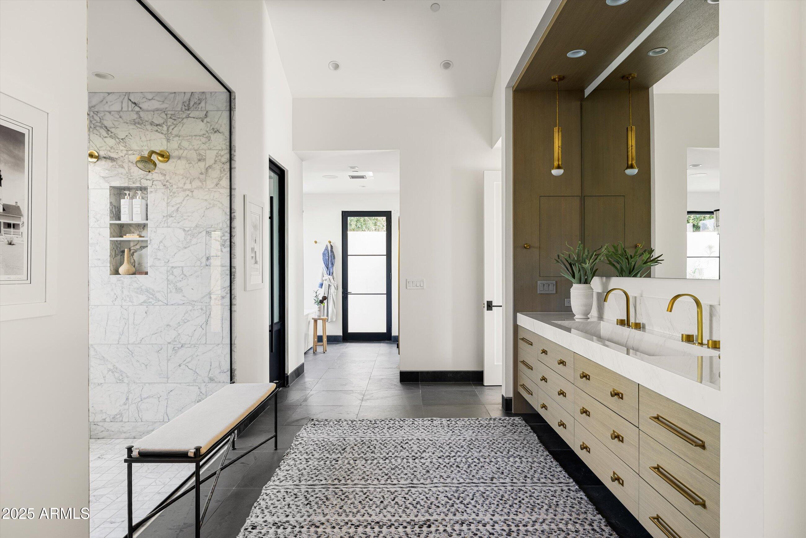 5715 East Monterosa Street Phoenix, AZ 85018 - Photo 21 of 113 a bathroom with a double vanity sink a mirror and a shower