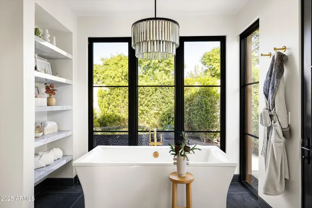 a bathroom with a toilet sink and a shower