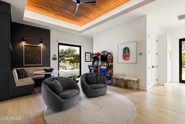 a front view of house with yard and outdoor seating