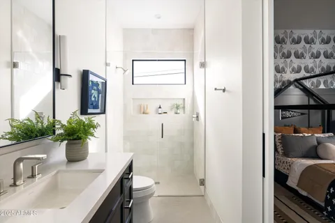 an aerial view of residential houses and trees