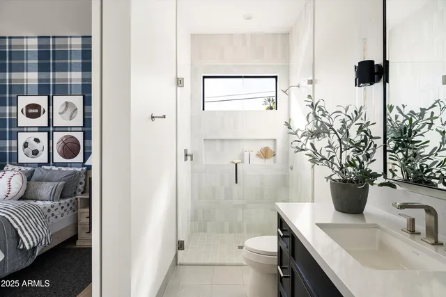 a front view of a house with a garden and outdoor seating