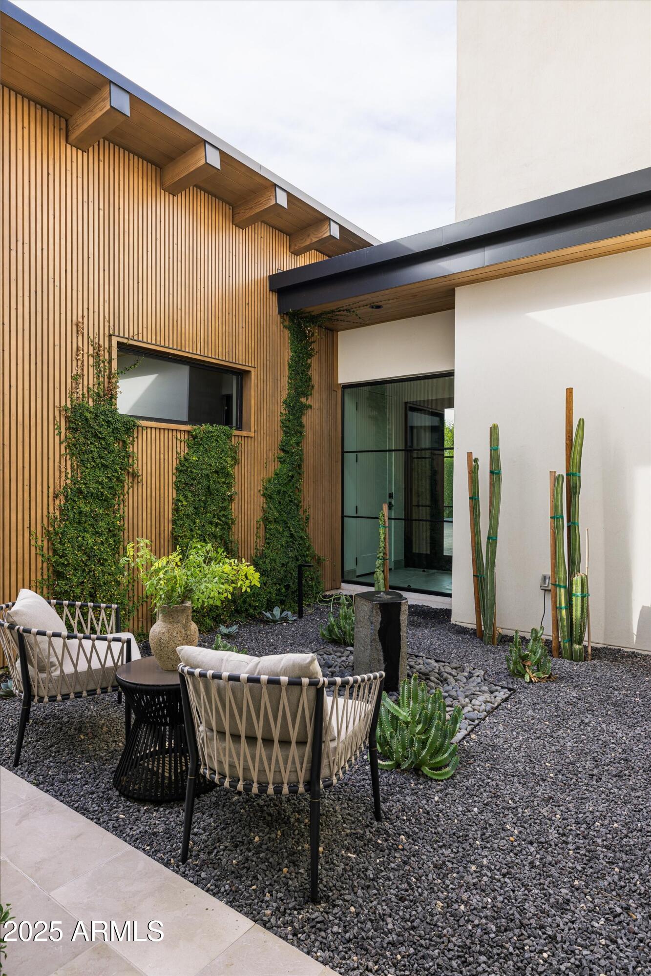 5715 East Monterosa Street Phoenix, AZ 85018 - Photo 39 of 113 a view of a house with backyard and sitting area