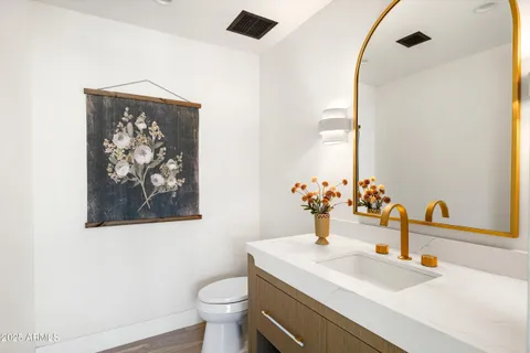 a bathroom with a bathtub and next to a window