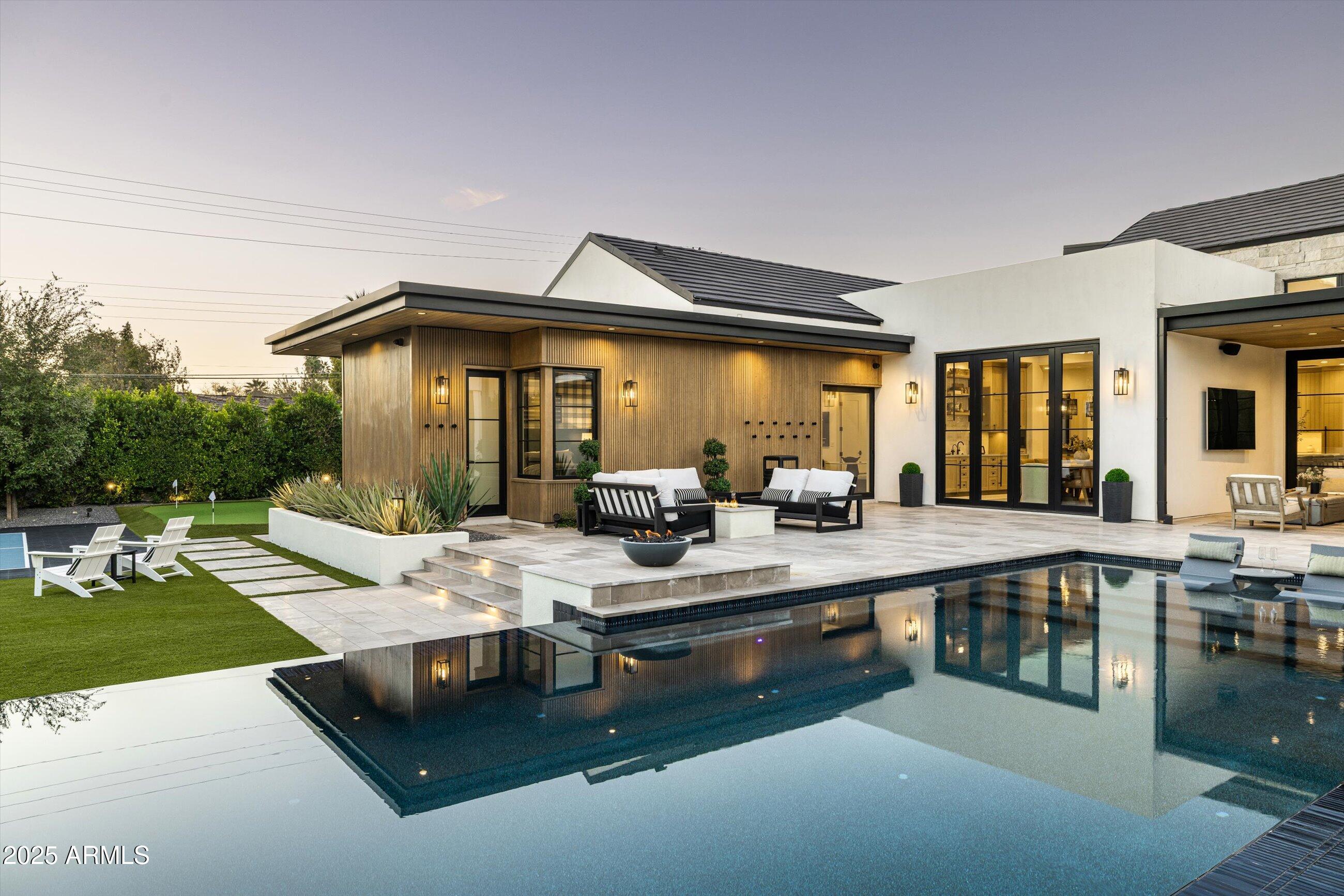 5715 East Monterosa Street Phoenix, AZ 85018 - Photo 54 of 113 a living room with lots of furniture and a large window