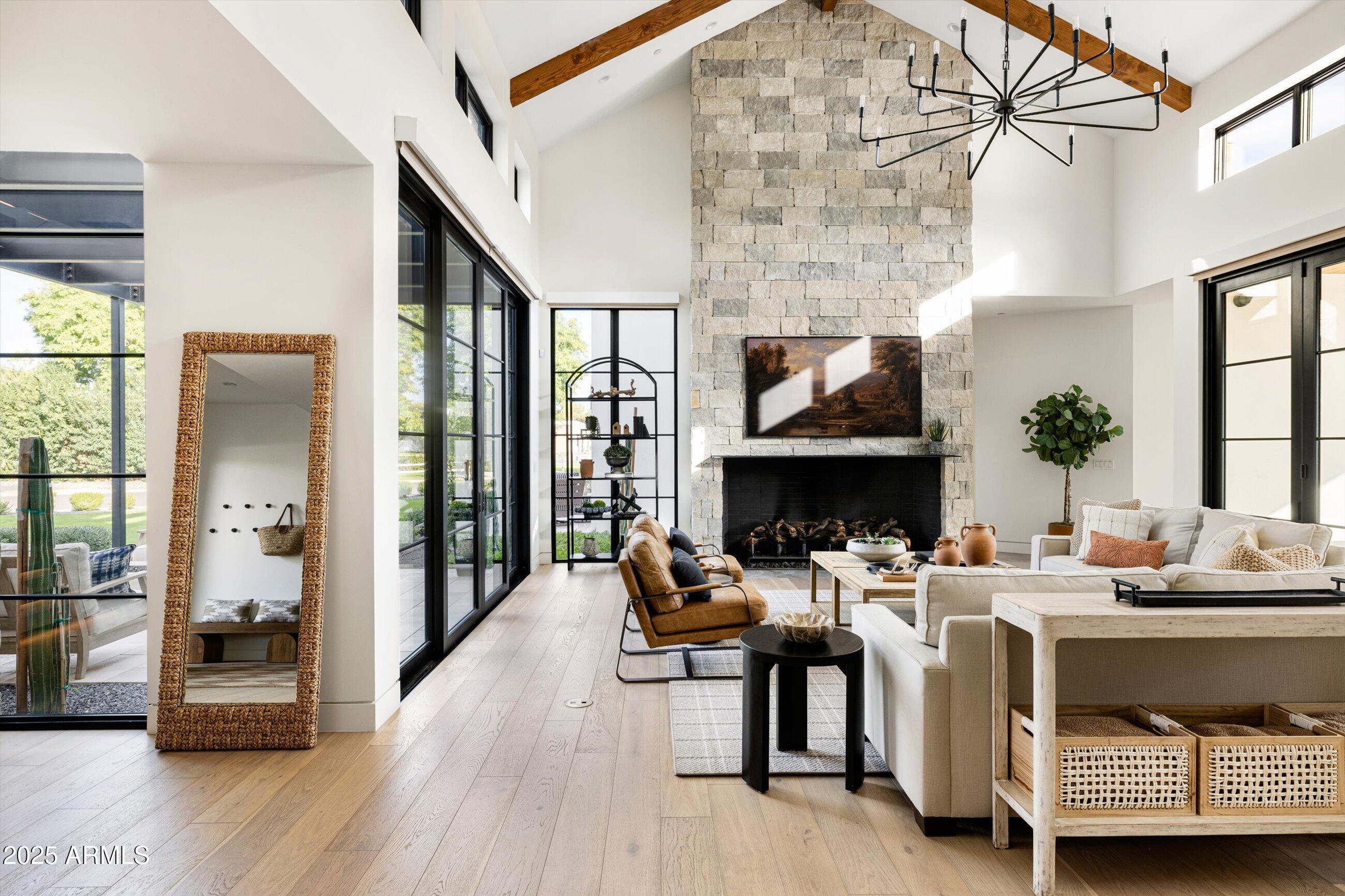5715 East Monterosa Street Phoenix, AZ 85018 - Photo 73 of 113 a living room with furniture and a fireplace