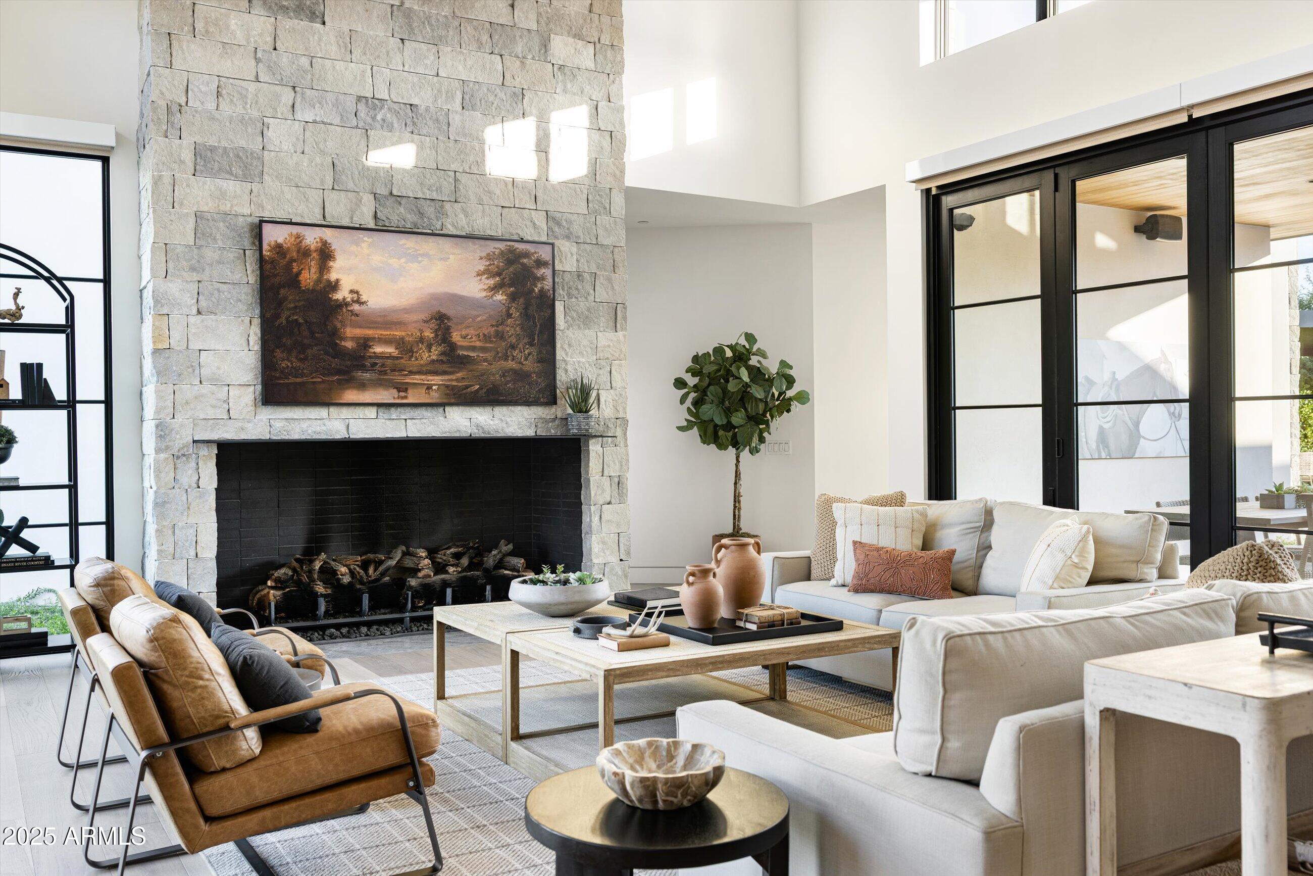 5715 East Monterosa Street Phoenix, AZ 85018 - Photo 76 of 113 a living room with furniture and a large window