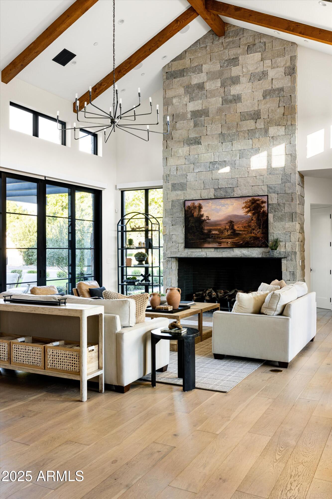 5715 East Monterosa Street Phoenix, AZ 85018 - Photo 77 of 113 a living room with furniture and a fireplace