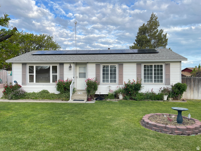 Undisclosed Address Magna, UT 84044 - Photo 1 of 1 Single-story residence featuring white siding and a gray shingle roof