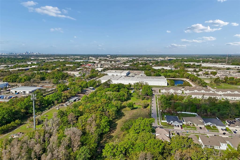6213 Orient Road Tampa, FL 33610 - Photo 19 of 51 an aerial view of residential building and car parked
