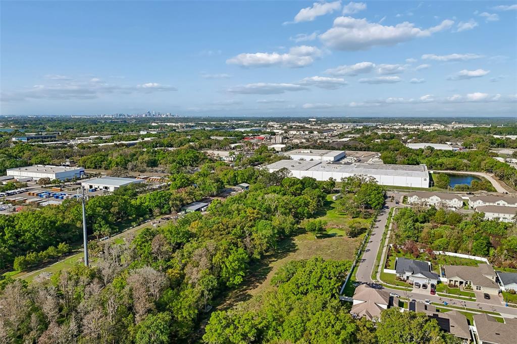 6213 Orient Road Tampa, FL 33610 - Photo 22 of 51 an aerial view of residential building with green space