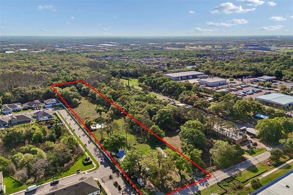 6213 Orient Road Tampa, FL 33610 - Photo 4 of 51 an aerial view of city
