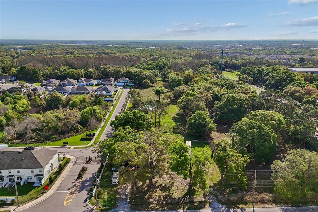 6213 Orient Road Tampa, FL 33610 - Photo 6 of 51 an aerial view of residential houses with outdoor space