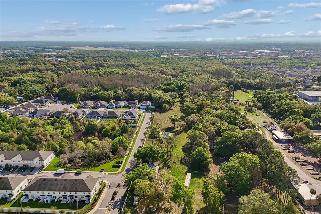 6213 Orient Road Tampa, FL 33610 - Photo 9 of 51 an aerial view of residential houses with outdoor space