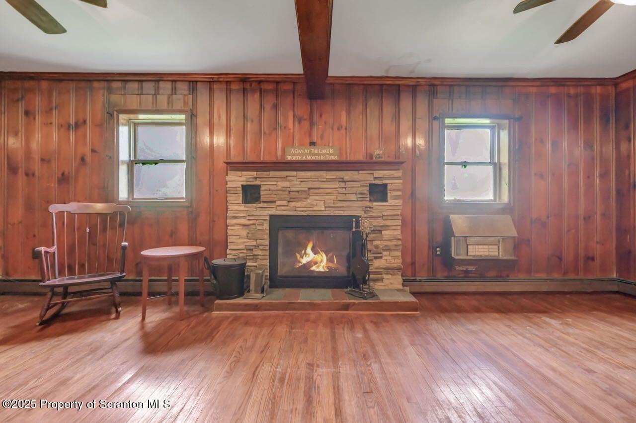 50 Little Lake Road Lake Ariel, PA 18436 - Photo 15 of 73 a living room with furniture and a fireplace