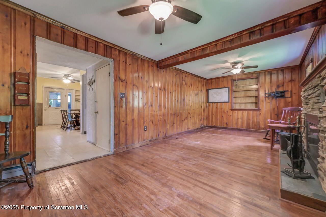 50 Little Lake Road Lake Ariel, PA 18436 - Photo 18 of 73 a very nice looking room with a ceiling fan and hardwood floor