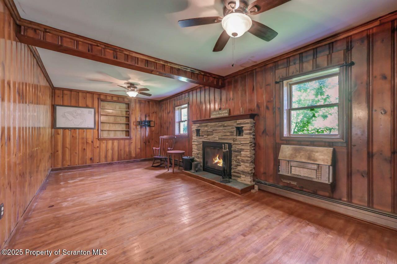 50 Little Lake Road Lake Ariel, PA 18436 - Photo 19 of 73 a view of an empty room with a fireplace and a window