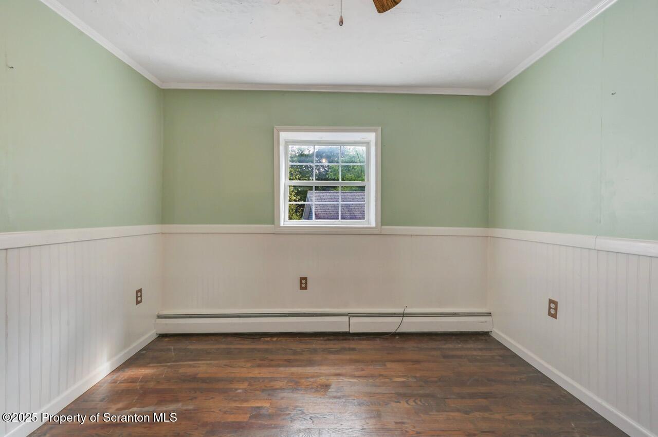 50 Little Lake Road Lake Ariel, PA 18436 - Photo 25 of 73 an empty room with wooden floor and window