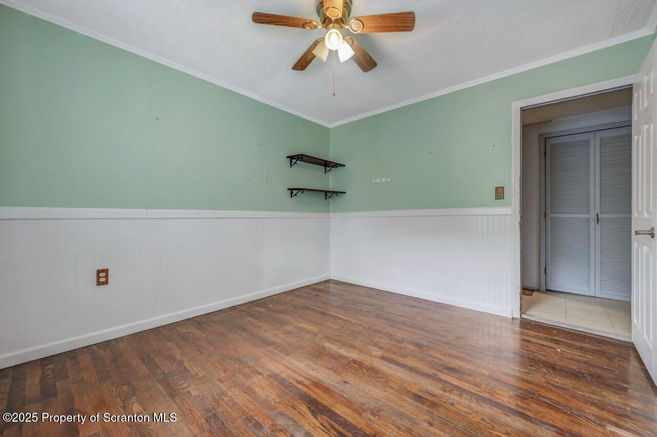 50 Little Lake Road Lake Ariel, PA 18436 - Photo 26 of 73 a view of a room with wooden floor and ceiling fan