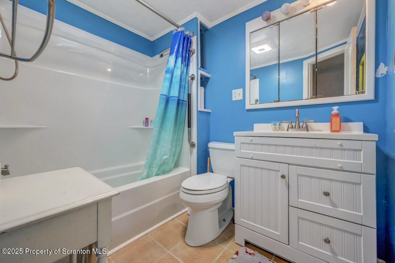50 Little Lake Road Lake Ariel, PA 18436 - Photo 27 of 73 a bathroom with a sink toilet vanity and tub