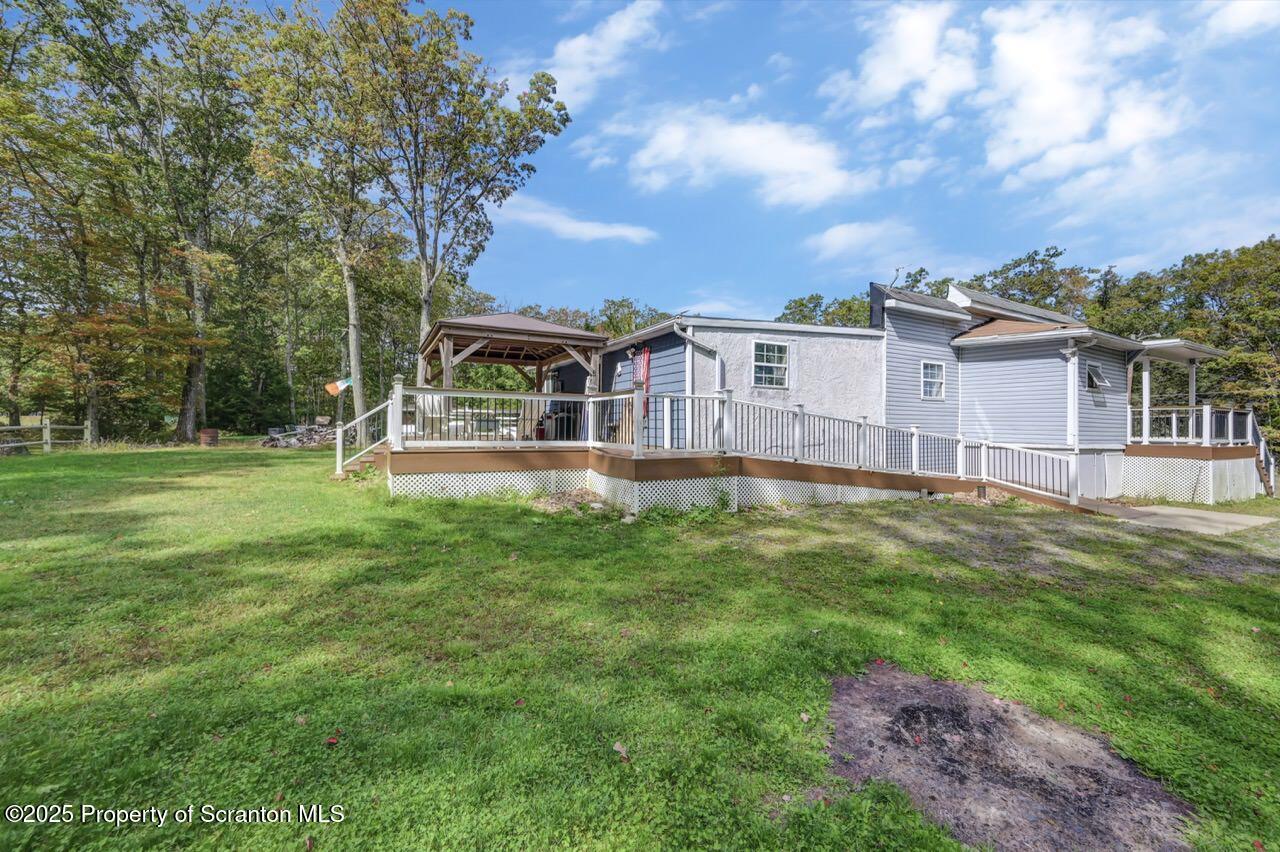 50 Little Lake Road Lake Ariel, PA 18436 - Photo 65 of 73 a view of a house with a big yard and large trees