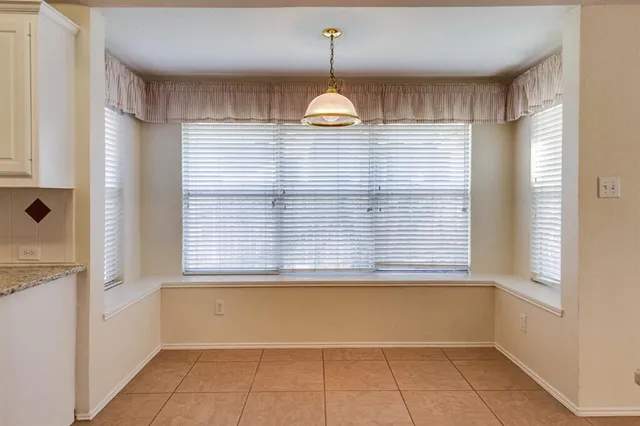 a view of a room with a large window