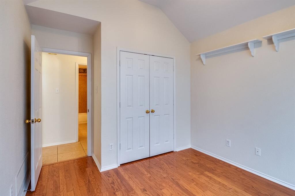 1304 Meredith Drive Allen, TX 75002 - Photo 15 of 28 a view of hallway with wooden floor