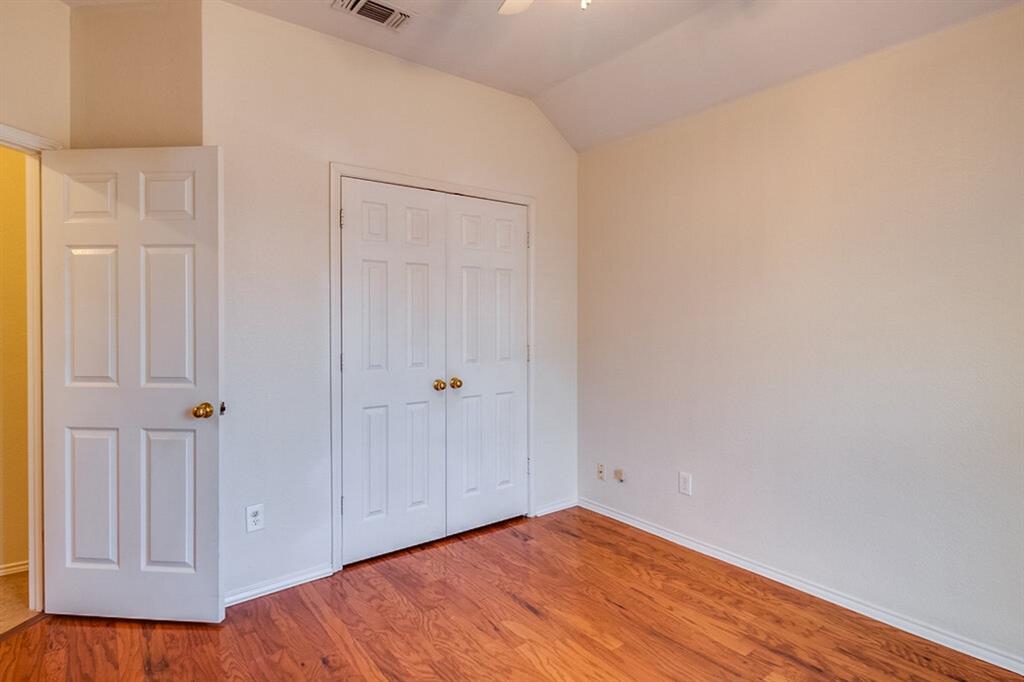 1304 Meredith Drive Allen, TX 75002 - Photo 17 of 28 a view of an empty room with wooden floor
