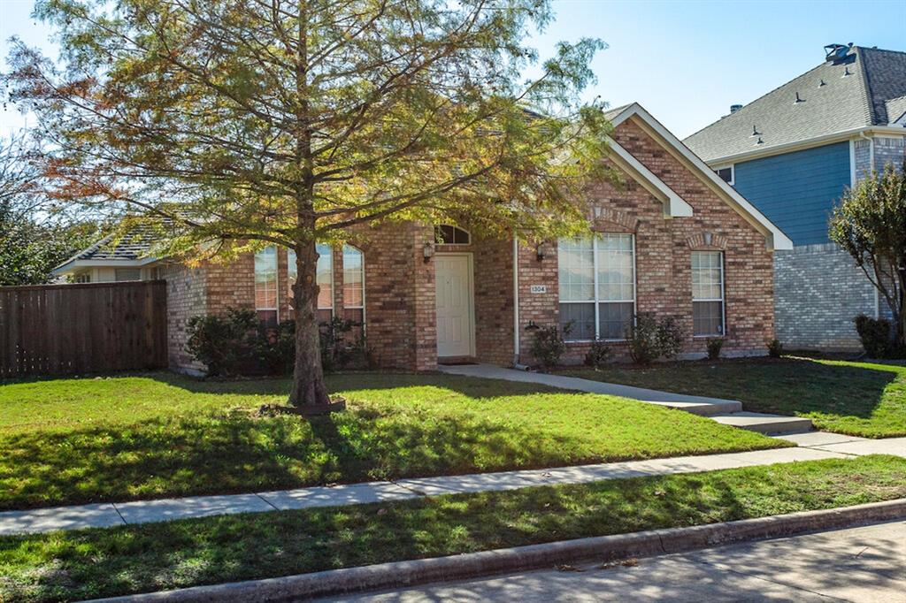 1304 Meredith Drive Allen, TX 75002 - Photo 2 of 28 a view of a patio in front of house