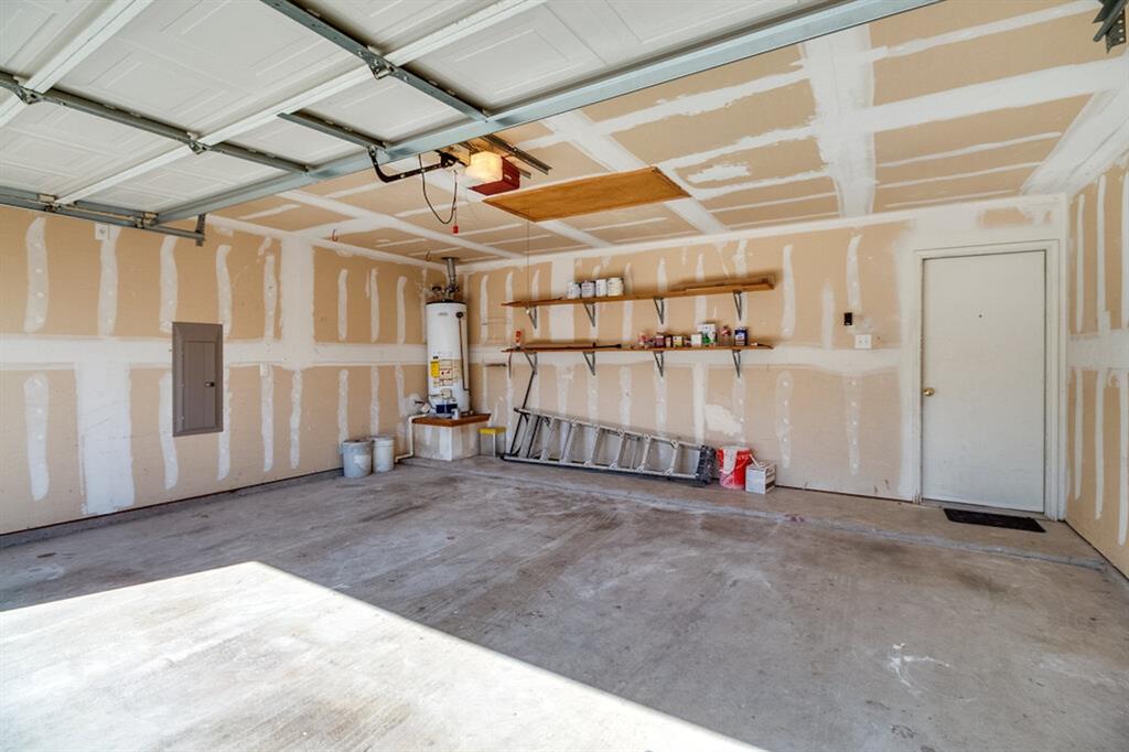 1304 Meredith Drive Allen, TX 75002 - Photo 25 of 28 a view of a room with wooden walls