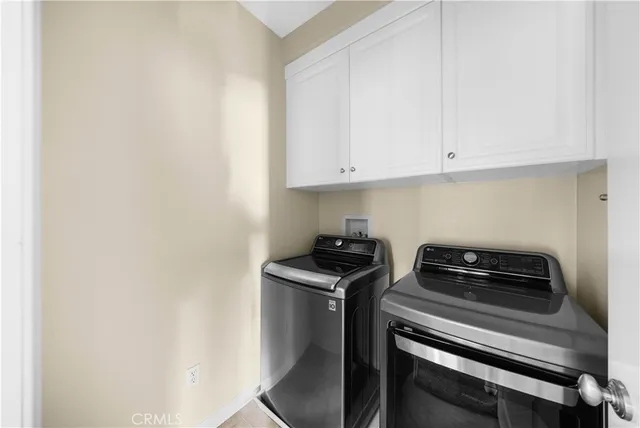 a view of kitchen with sink and stove