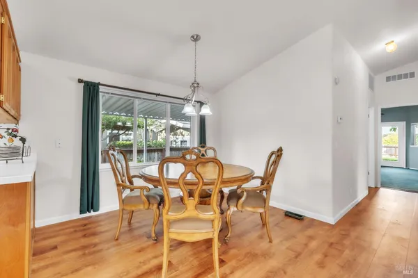 a view of cabinets with wooden floor