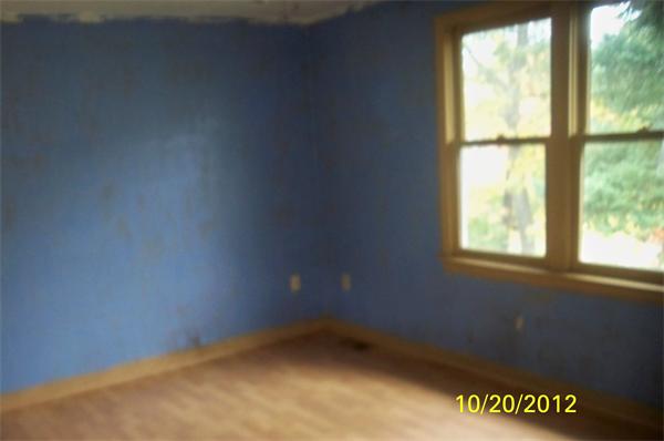 64 Mission Road Tyngsborough, MA 01879 - Photo 4 of 7 an empty room with a window