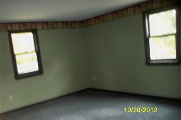 64 Mission Road Tyngsborough, MA 01879 - Photo 5 of 7 a view of an empty room with a window