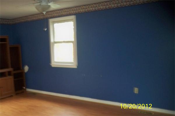 64 Mission Road Tyngsborough, MA 01879 - Photo 7 of 7 a view of an empty room with a window