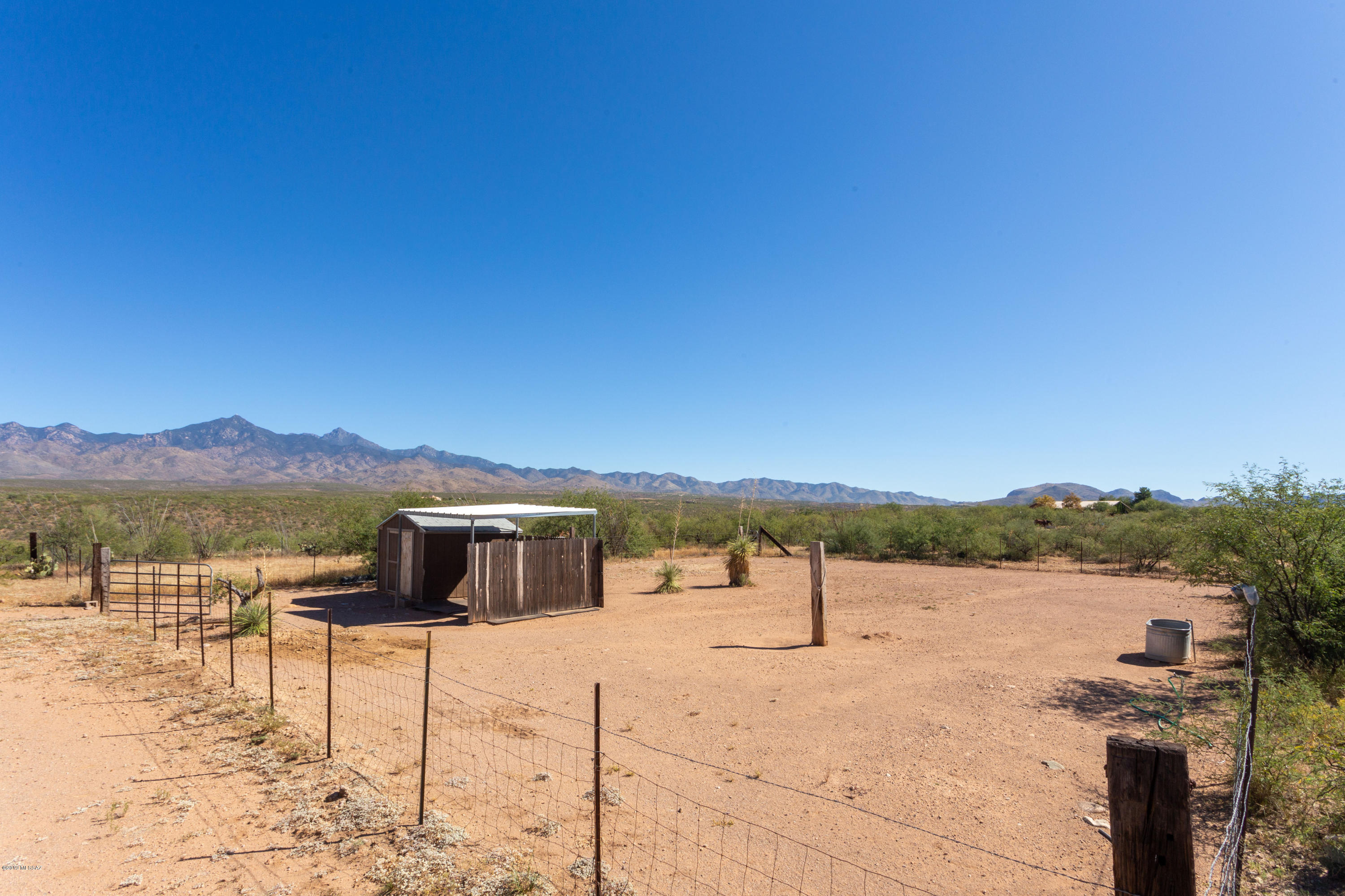 79 Camino Talavera Rio Rico, AZ 85648 - Photo 43 of 50 a view of a lake with a mountain in the background