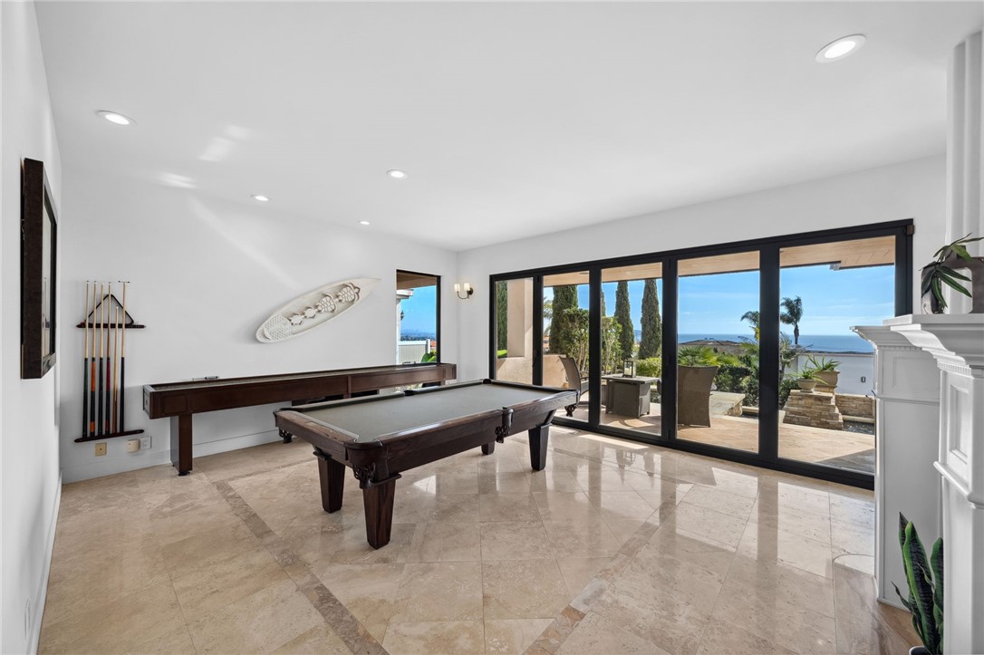 5381 Moonlight Lane La Jolla, CA 92037 - Photo 15 of 44 a room with furniture and a large window