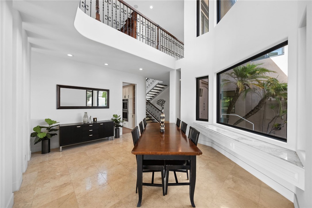 5381 Moonlight Lane La Jolla, CA 92037 - Photo 21 of 44 a living room with furniture a table and a potted plant
