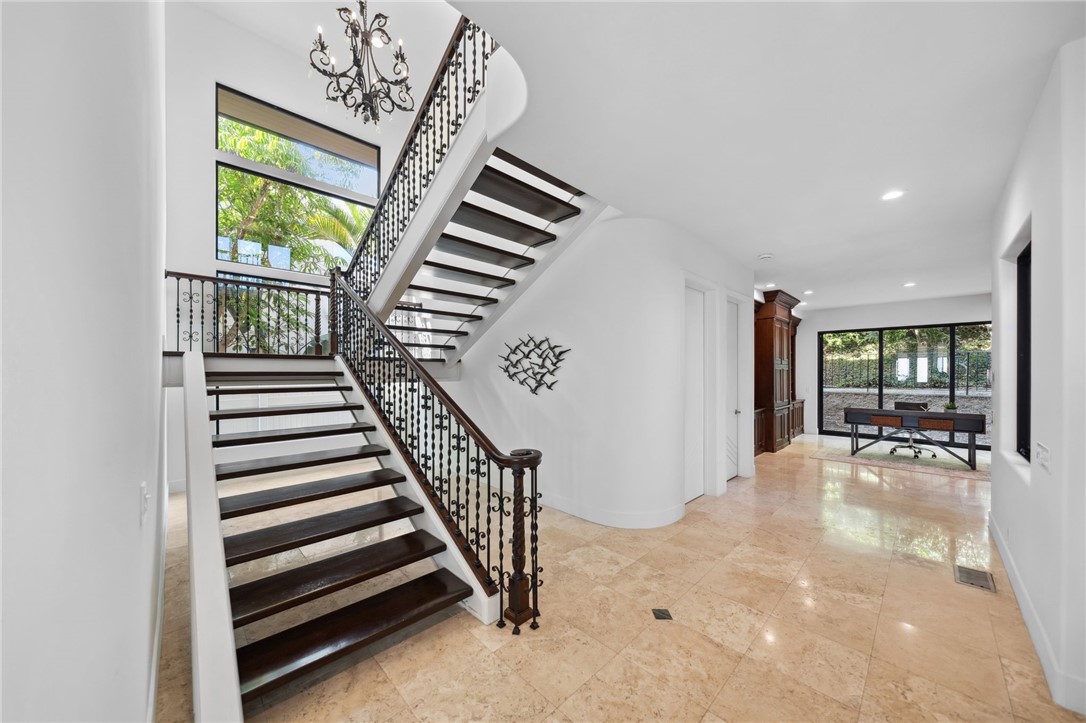5381 Moonlight Lane La Jolla, CA 92037 - Photo 22 of 44 en view interior of a house with wooden floor windows and stairs